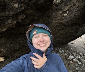 Iris Haley takes a selfie on a beach