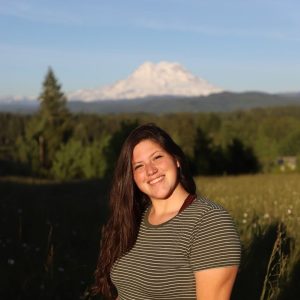 Ashley Rendon pictured with a large white mountain in the background