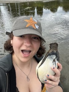 Kaiya holding a geoduck