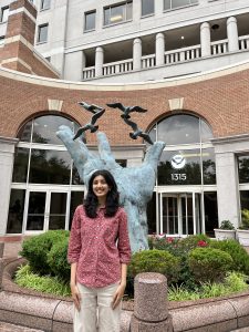 Mugdha Chiplunkar outside of NOAA HQ