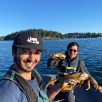 My research partner and I running a test to see how many crabs we can catch before starting our research project.