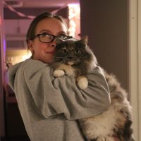 woman and cat