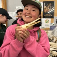 Student with fish skeleton