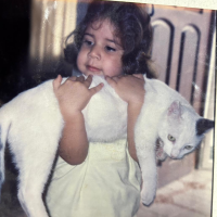 Childhood Photo with cat: San Cristobal, Venezuela, Holding my grandma's cat, Pancho