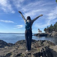 woman with arms in the air