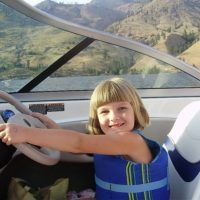 child on boat