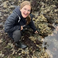 Woman on tide pool