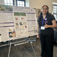 student with poster