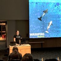 student at podium for films screening