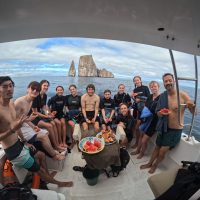 Group on boat near Kicker Rock