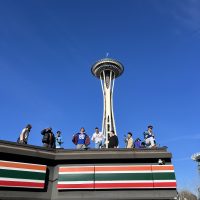 Group in front of space needle