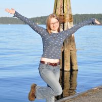 Taking grad photos with classmates on the dock at FHL