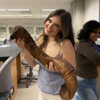 Woman holding eel