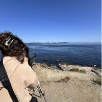 Elise looking out scope