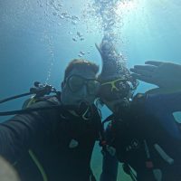 two scuba divers underwater