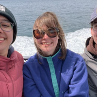 3 people on whale watching trip